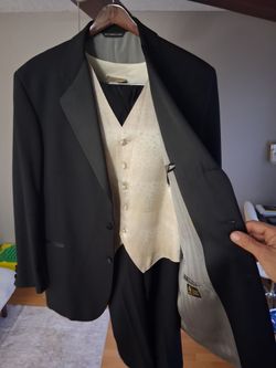 Black 3 piece tuxedo by Steven Land