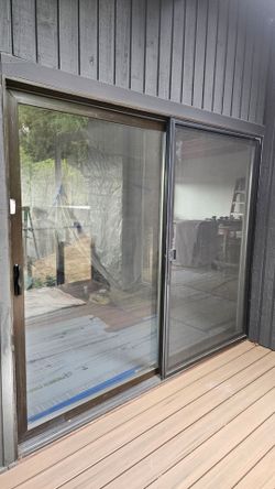 Two matching 8 ft Sliding doors