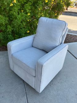 Modern light grey swivel glider chair ( can deliver for $10 )