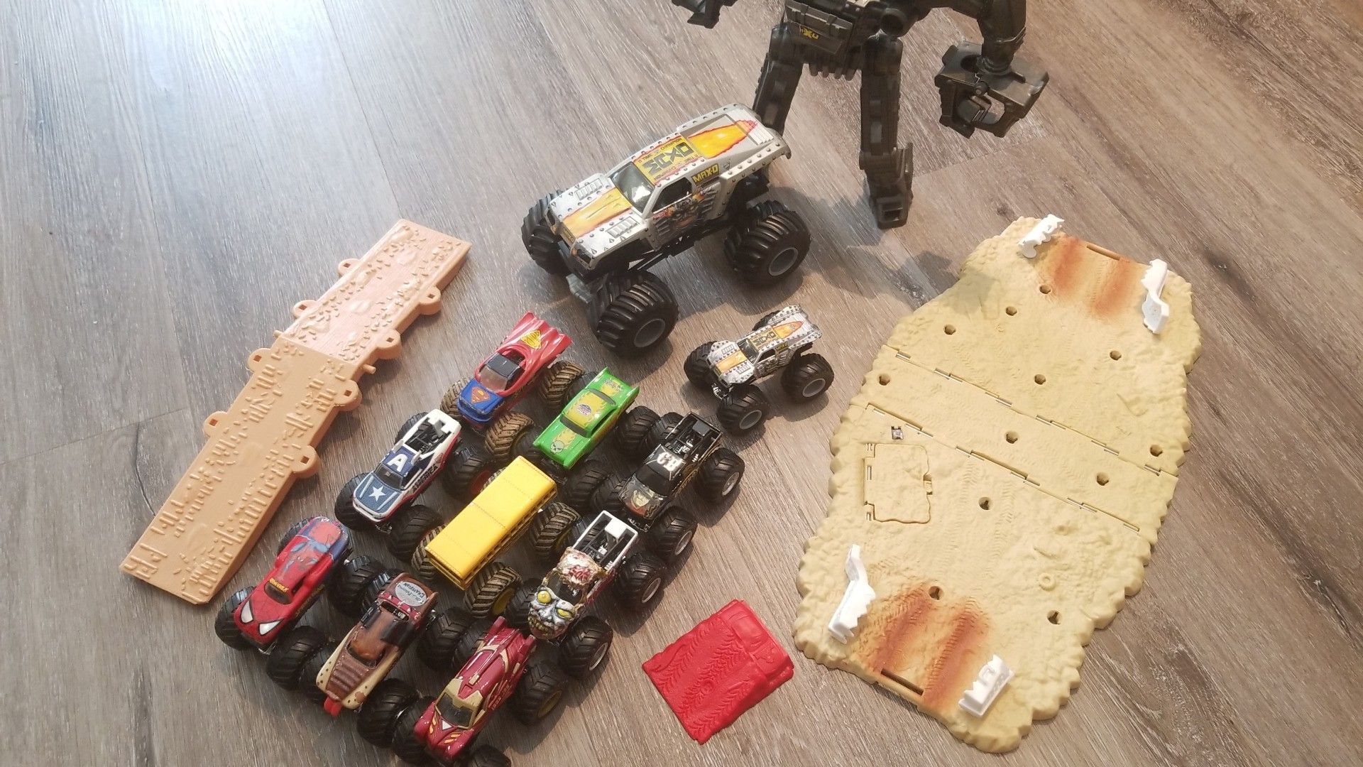 Price Drop: ALL FOR JUST $28! Monster jam trucks truck super hero collection and Max D + arena