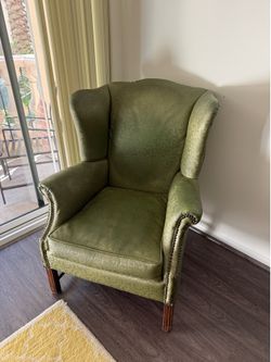 Green vintage leather wooden chair
