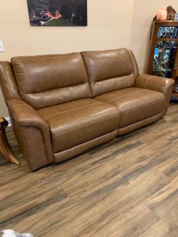 Brown leather sofa and loveseat