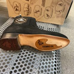 Botines charros de piel marca El Canelo