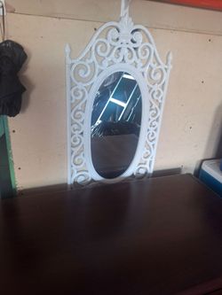 Espejo decorativo mide 3 cuartas 3 cuartos de alto