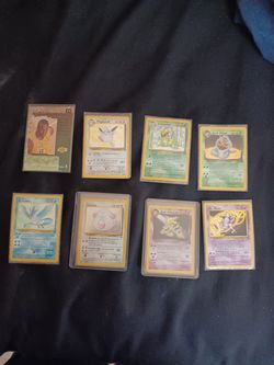Kobe rookie and random Pokémon holos
