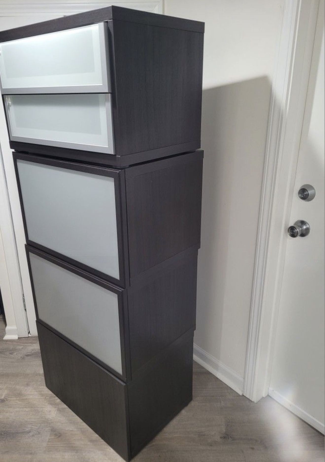 SET OF FOUR NEW STORAGE CABINETS , GREAT FOR AN OFFICE OR GARAGE. 24INCHES  WIDE, 16 DEEP AND 15. INCHES TALL.  $100.00 OR BEST OFFER.
