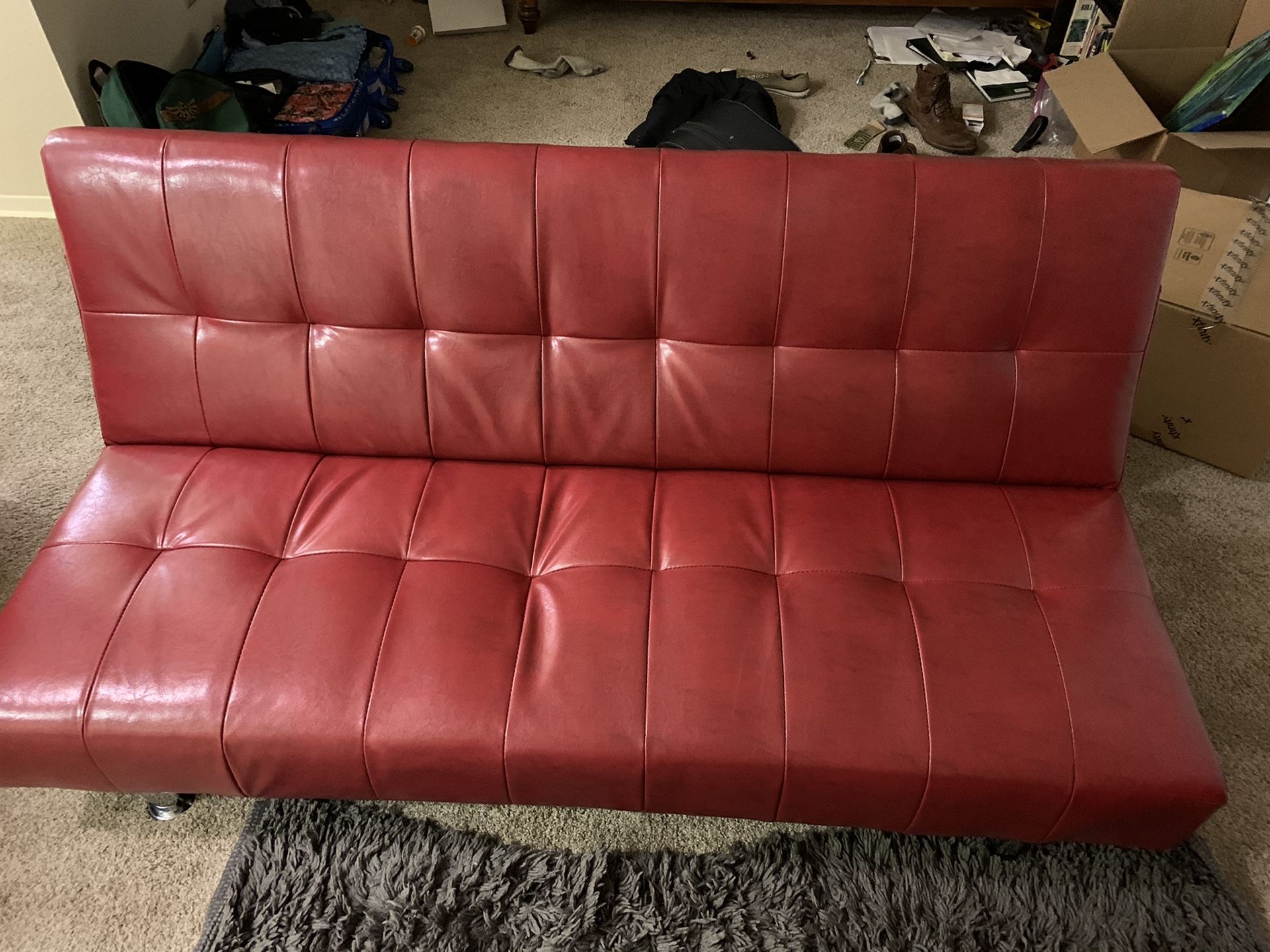 Red faux leather futon