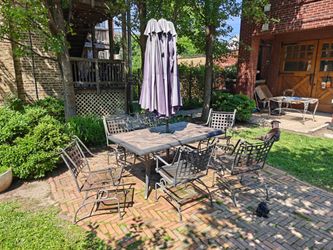 Vintage Metal/Tile Patio Table and Rocking Chairs