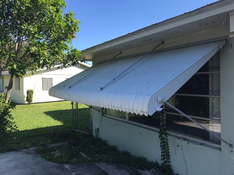 Six clamshell hurricane shutters for sale. for Sale in Stuart, FL OfferUp