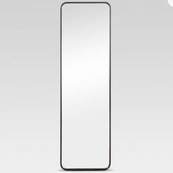 Black metal framed mirror