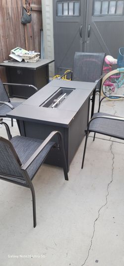 Brand new 43" Propane Fire Pit Table With 4 brand new chairs . Lowballers Will Be Ignored