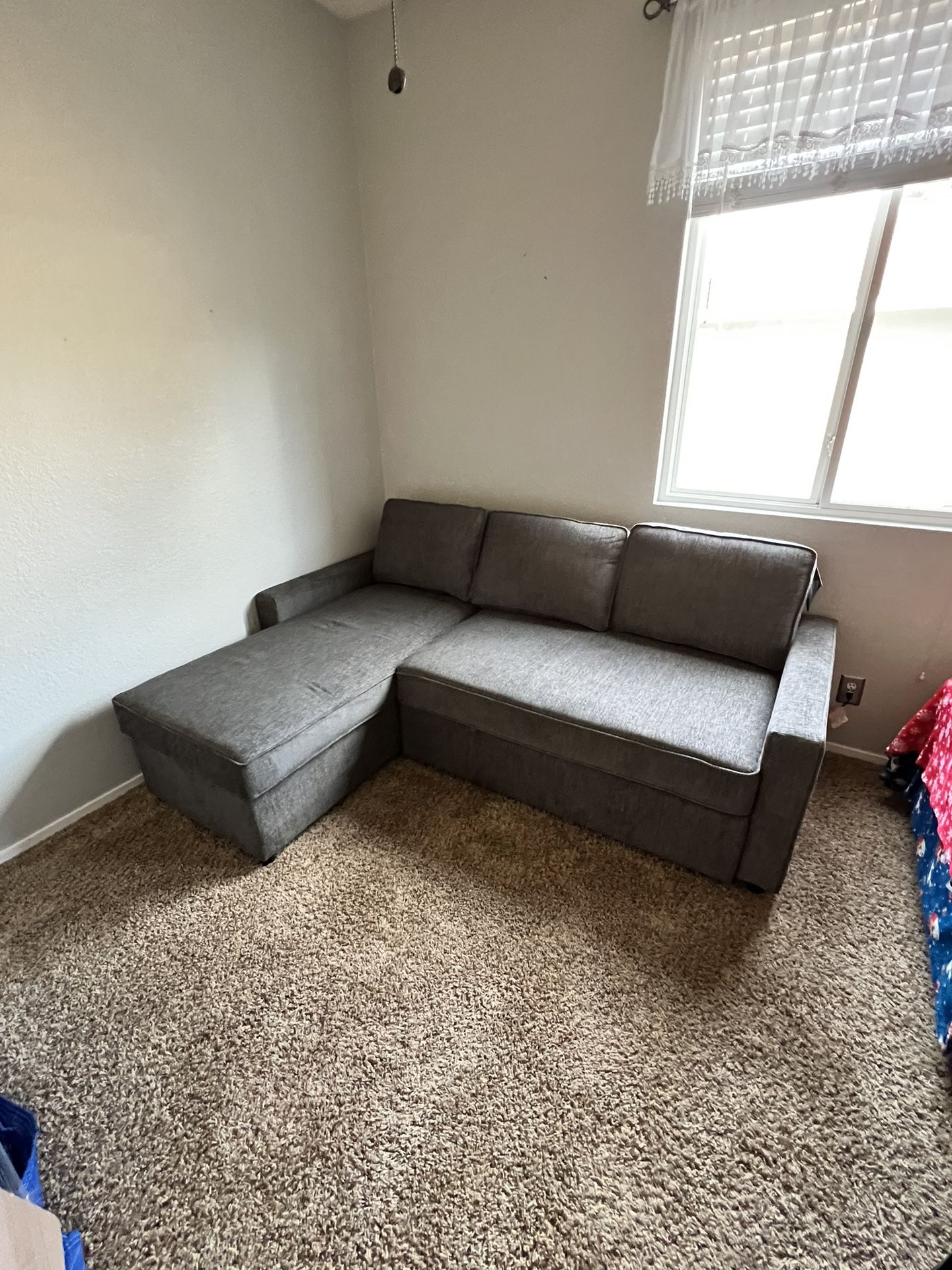 Kerle 2-Piece Sectional with Pop Up Bed