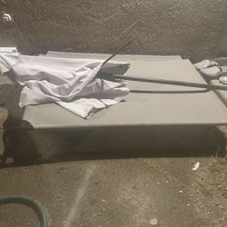 A Dog House And Dog Bed Used