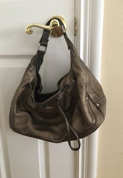 Gold Kenneth Cole purse