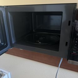 Smaller microwave that fits everything in excellent condition asking 25