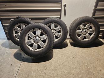 275/65R20 Goodyear wrangler tires and rims