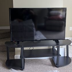 Flatscreen TV and TV Stand