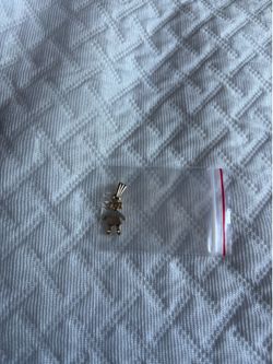 Dijen de una niña de oro brasileño para cadena