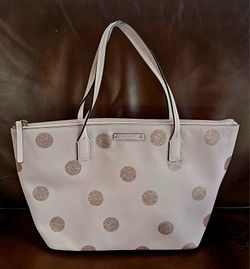 Kate Spade Haven Lane Hani tote bag, specifically featuring a pink glitter polka dot design. 