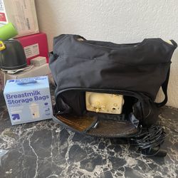 Medela Breast Pump, Medela Hand Pump, And Storage Milk Bags