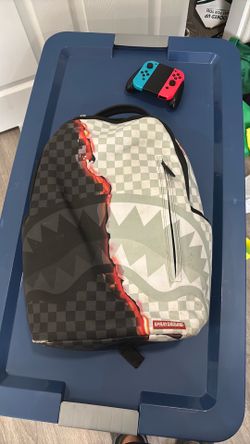Spray ground backpack