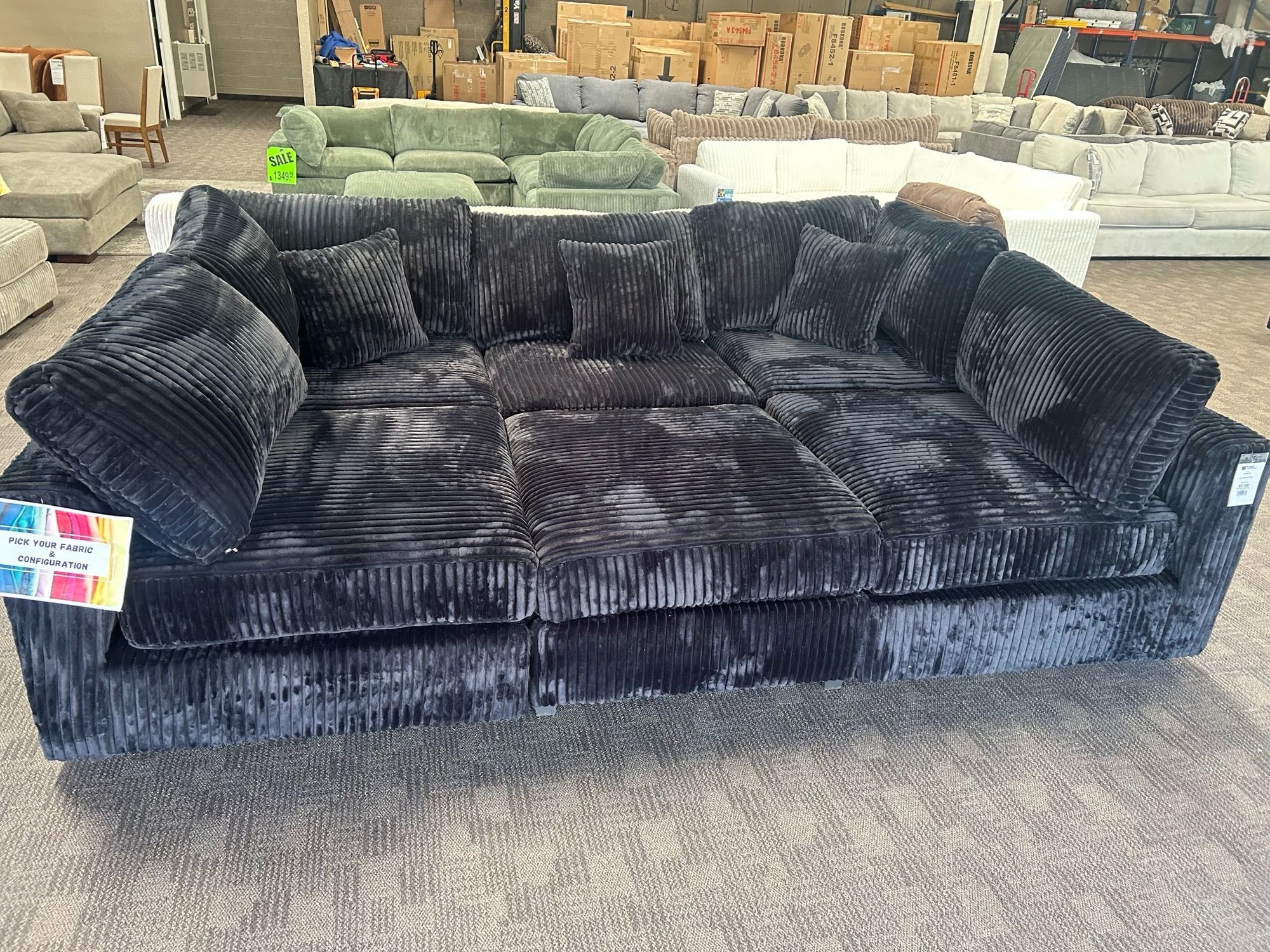 Deep comfy black modular pit couch sectional