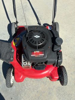 MTD push lawn mower with side discharge.  Starts right up.  Price is firm.