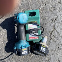 Makita Impact Wrench  14.3v 3/8 Used Charger And Battery