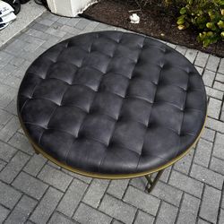 Polished Faux Leather Round Ottoman Modern With Gold Accents