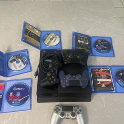 Play Station 4 With Controllers And Games