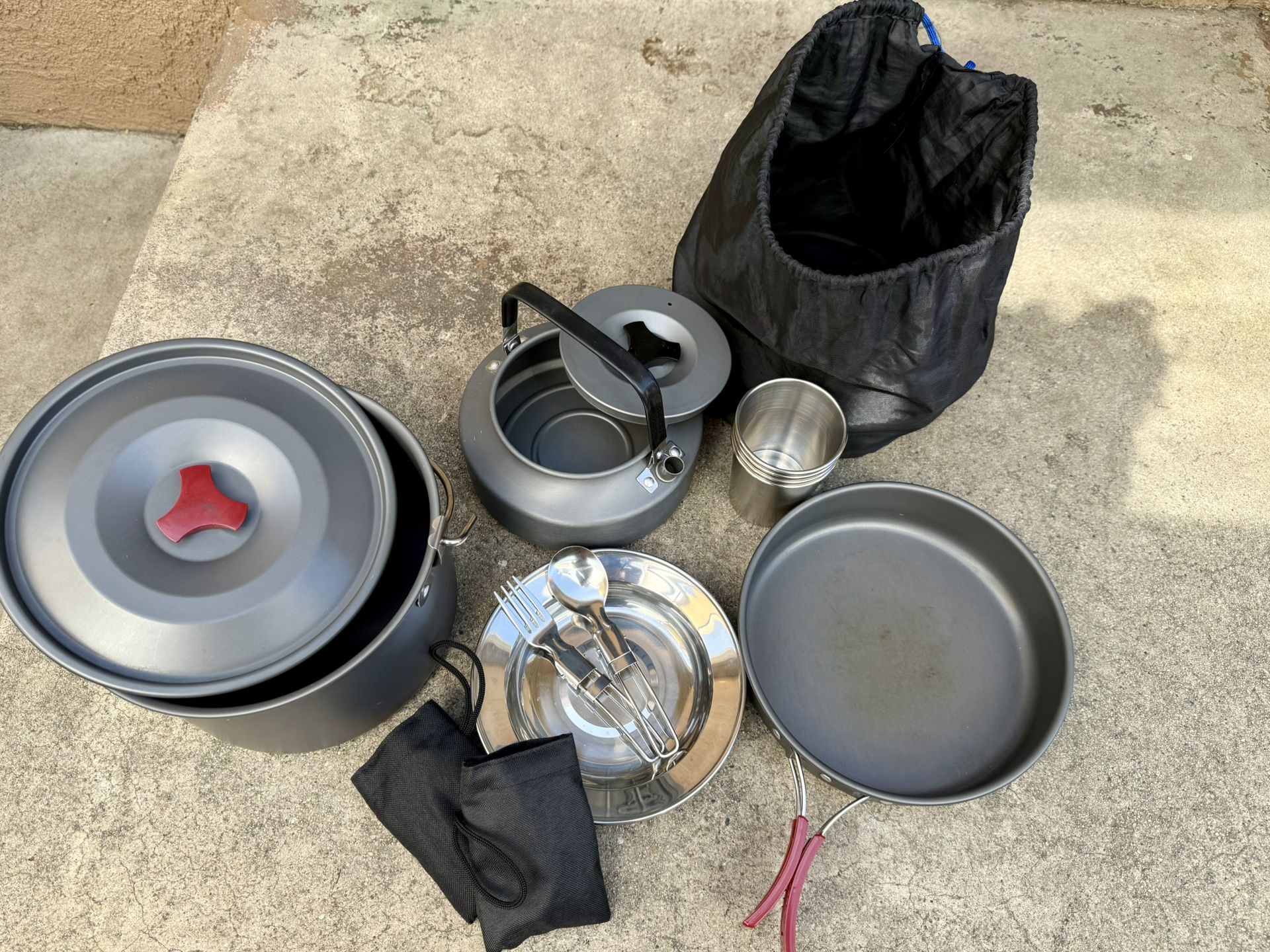 Pot , Pan , Kettle, 3 Cups , 3 Plate/bowls And 3set Eating Utensils.