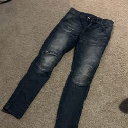 Distressed Blue Denim Jeans with Knee Patches