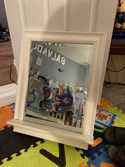 Mirror with ledge