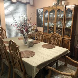 Antique Early1960’s Rococo dining room set with matching China hutch.