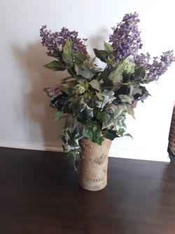 Butterfly vase with silk flowers and ivy