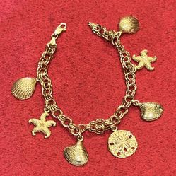 Beautiful Vintage 14KT (11.43g) ZRW Ocean Themed Gold Charm Bracelet. 