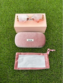 Miu Miu Pink Women’s Sunglasses