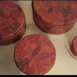 This great set of 4 matching tins with lids 8" 7" 6" 3"