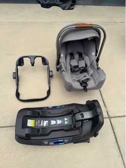 Nuna Pipa RX infant car seat with stroller adapter