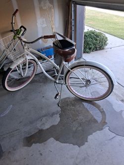Six three zero ladies beach cruiser bicycle.