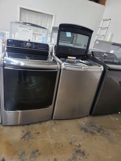 LG SET STEAM WASHER AND ELECTRIC DRYER JUMBO STAINLESS STEEL WITH TOWELL WARMELL