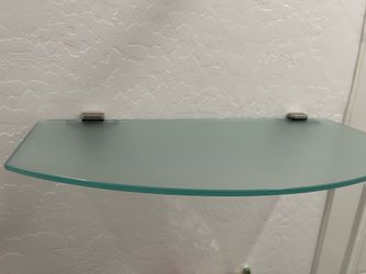 Two Beautiful glass shelves.