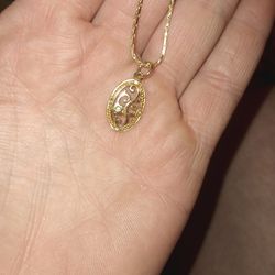 Gold And Silver Pendant 