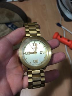 Gold Nixon watch