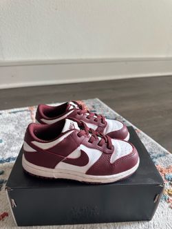 Kids Nike Dunk Low sneakers in burgundy and white