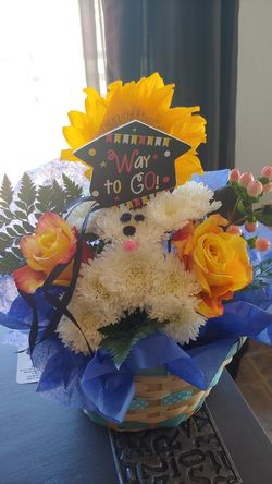 Graduation puppy 🐶 flower arrangements