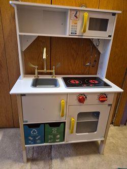 Wooden play  kitchen with accessories