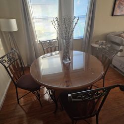 For sale- Round dining table with glass + 4  chairs!$350