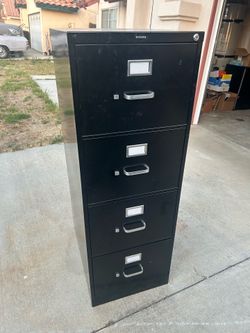 Black file cabinet 40$ obo