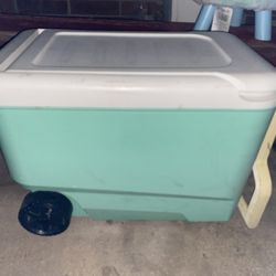Igloo Wheelie Cool 38 qt rolling cooler in mint green.